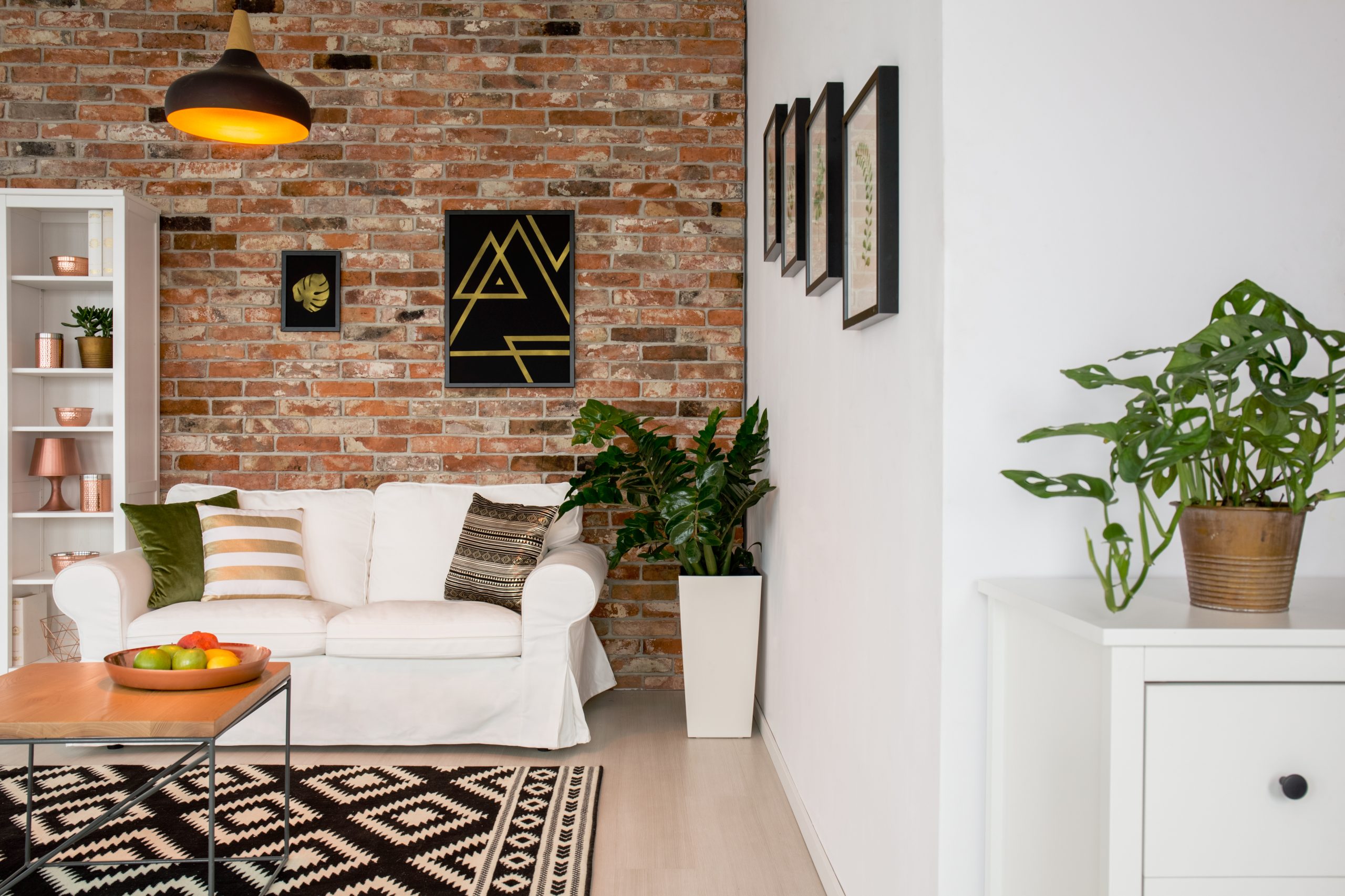 Industrial-inspired residential interior painting in Naples, FL featuring urban color palettes like charcoal, concrete neutrals, and matte black.